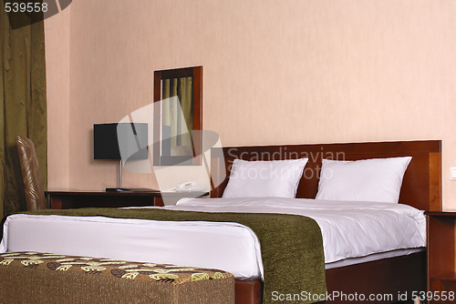 Image of Part of interior of hotel bedroom