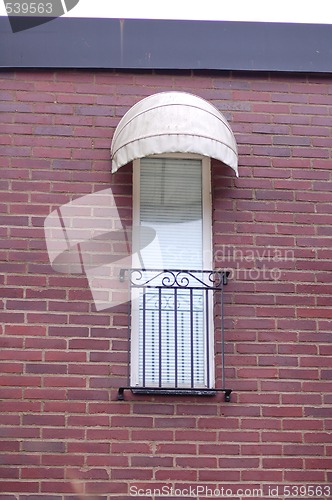 Image of Balcony on a brick wall