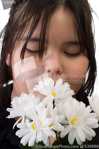 Image of Girl Smelling Flowers