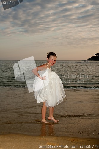 Image of Flower girl in the sand