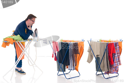 Image of Houseman doing the laundry