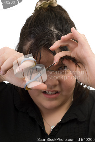 Image of Child Cutting Own Hair