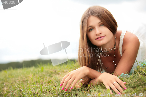 Image of girl lying on herb