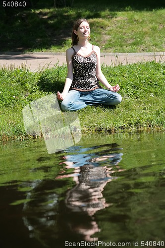 Image of girl is meditating