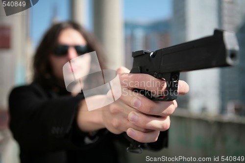 Image of hands of the killer