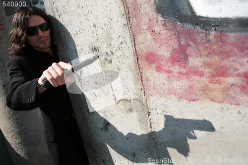 Image of man with gun