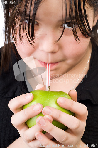 Image of Girl Drinking Apple Juice