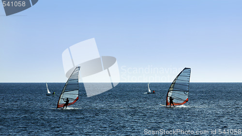 Image of two windsurfer