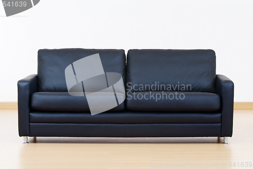 Image of Black leather sofa