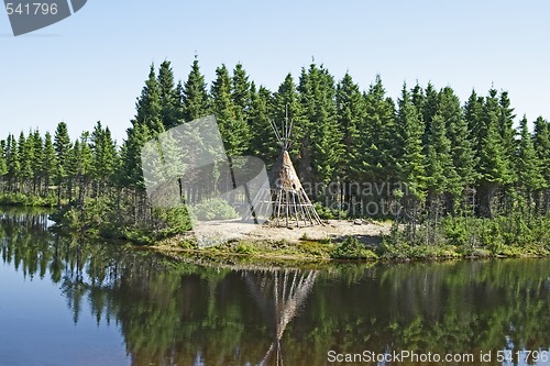 Image of Native American tipi on a lakeshore