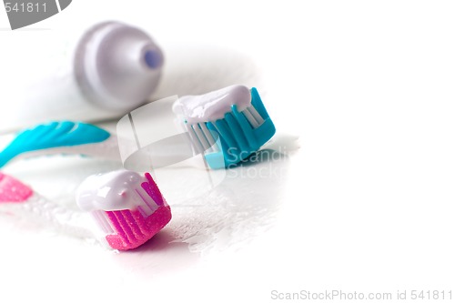 Image of toothpaste and toothbrushes