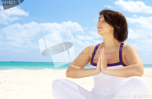 Image of meditation on the beach