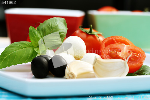 Image of mozzarella and cherry tomatoes