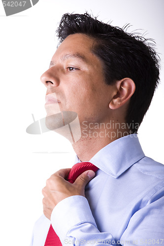 Image of adjusting the necktie
