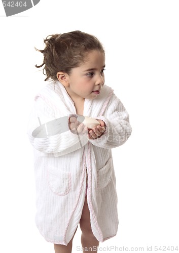 Image of Child holding soap, cleanliness