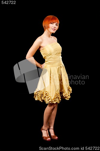 Image of Redhead in yellow dress