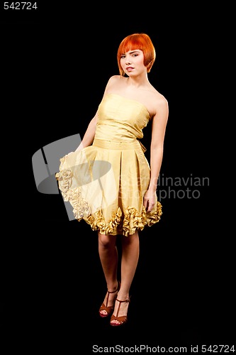 Image of Redhead in yellow dress