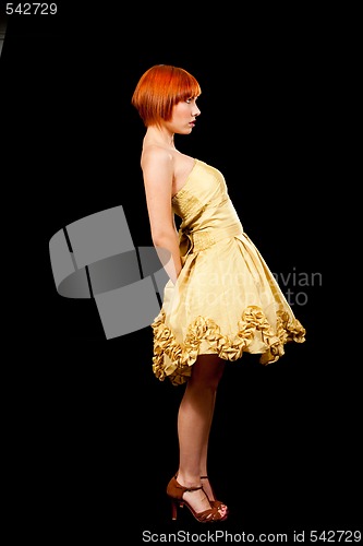 Image of Redhead in yellow dress