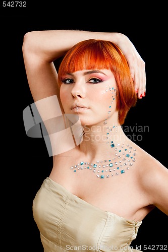 Image of Redhead with rhinestones
