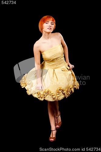 Image of Redhead in yellow dress