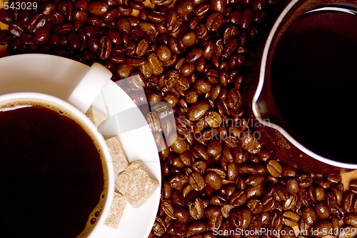 Image of coffee, caffee-maker over beans background