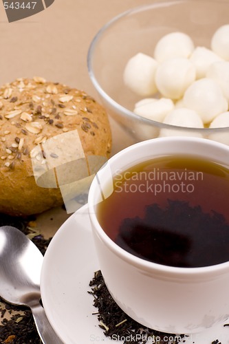 Image of tea, mozzarella and bread