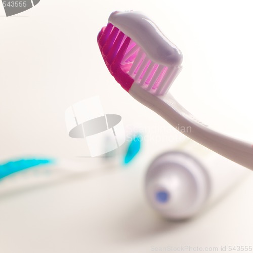 Image of toothbrushes and toothpaste