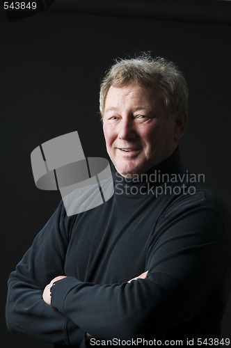 Image of happy smiling middle age senior man