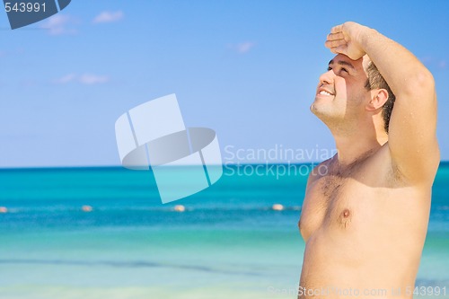 Image of happy man on the beach