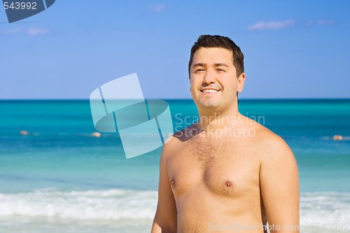 Image of happy man on the beach