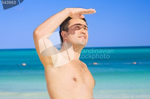 Image of happy man on the beach