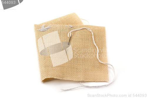Image of Fabrics, flax, needle with threaâ
