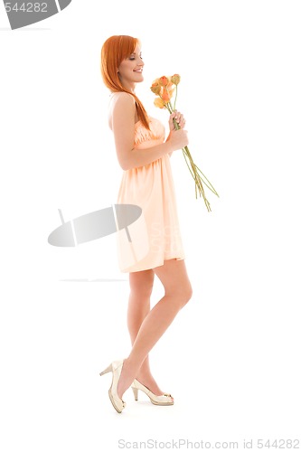 Image of redhead with flowers