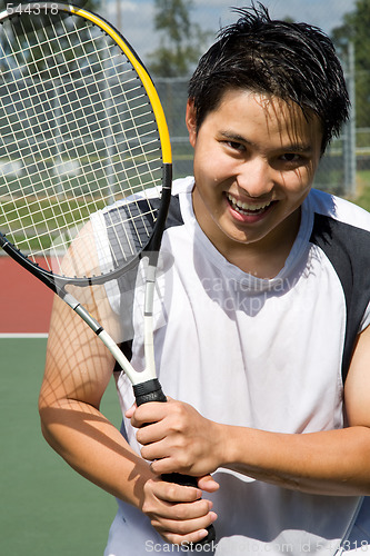 Image of Young asian tennis player