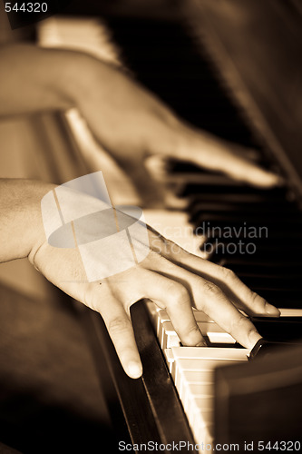 Image of Playing piano