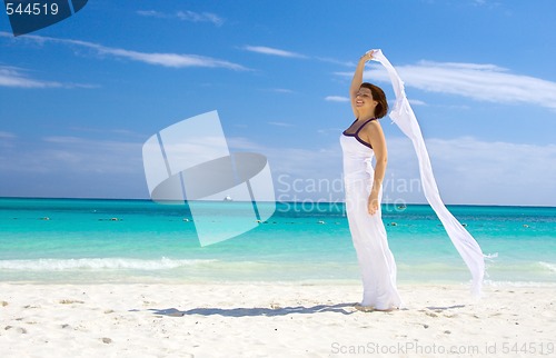 Image of happy woman with white sarong