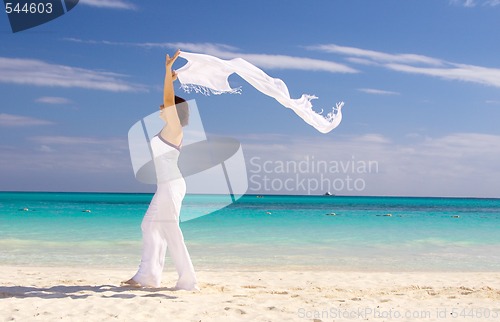 Image of happy woman with white sarong