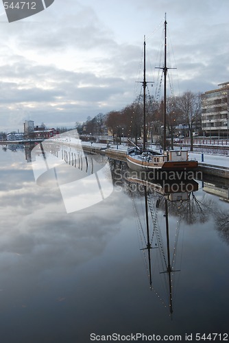 Image of Sailing Boat and Reflection in Water.