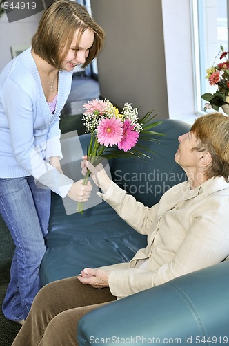 Image of Granddaughter visiting grandmother