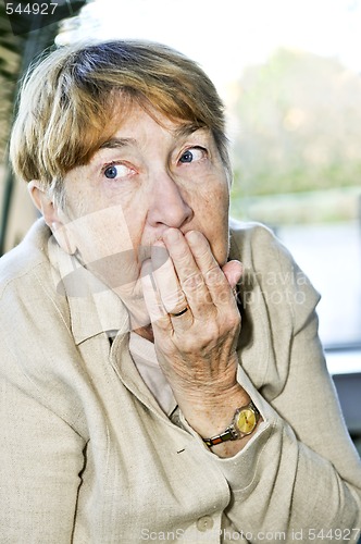 Image of Scared elderly woman