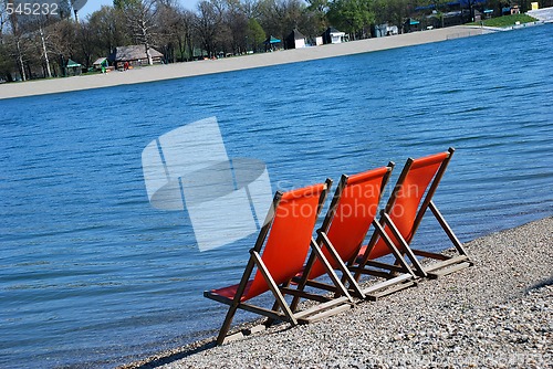 Image of Orange folding chairs