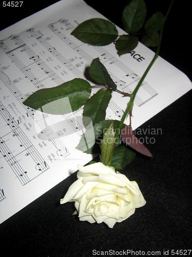 Image of Hymn sheet music and rose