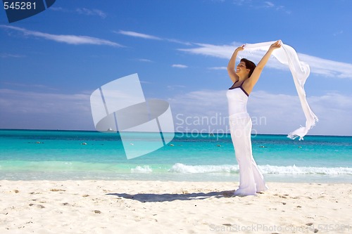 Image of happy woman with white sarong