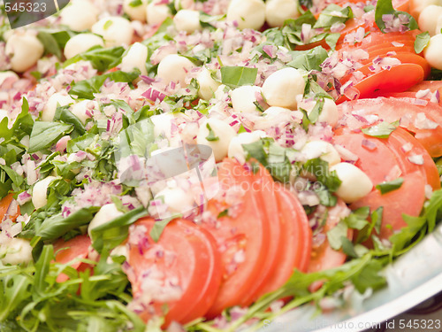 Image of Delicious colourful salad with tomato