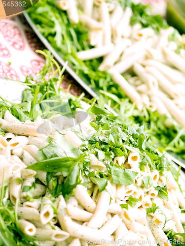 Image of Candid image of pasta salad on plates