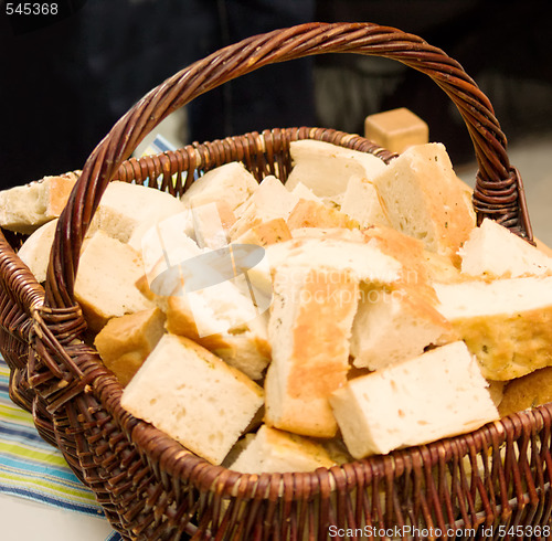 Image of Basket of home made  bread on a table