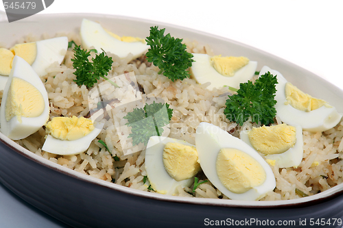 Image of Kedgeree rice with eggs and parsley horizontal