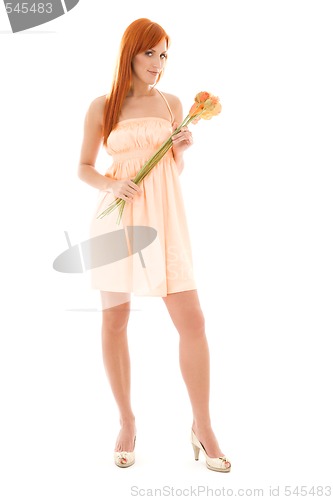 Image of redhead with flowers