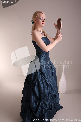 Image of Young woman with prom dress