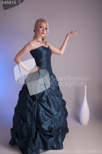 Image of Young woman with prom dress